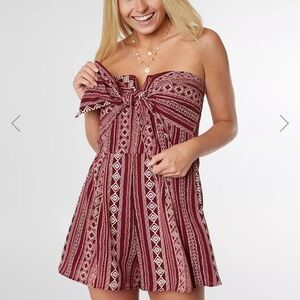 Gently worn romper from buckle